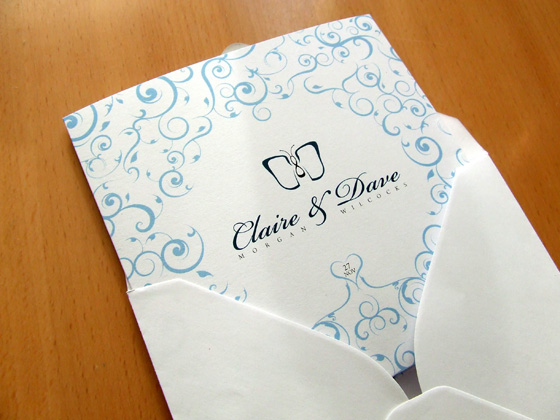 The finished invite, peeking out from a perfectly sized envelope.